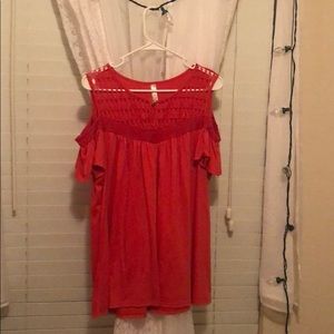 A formal coral orange shirt.